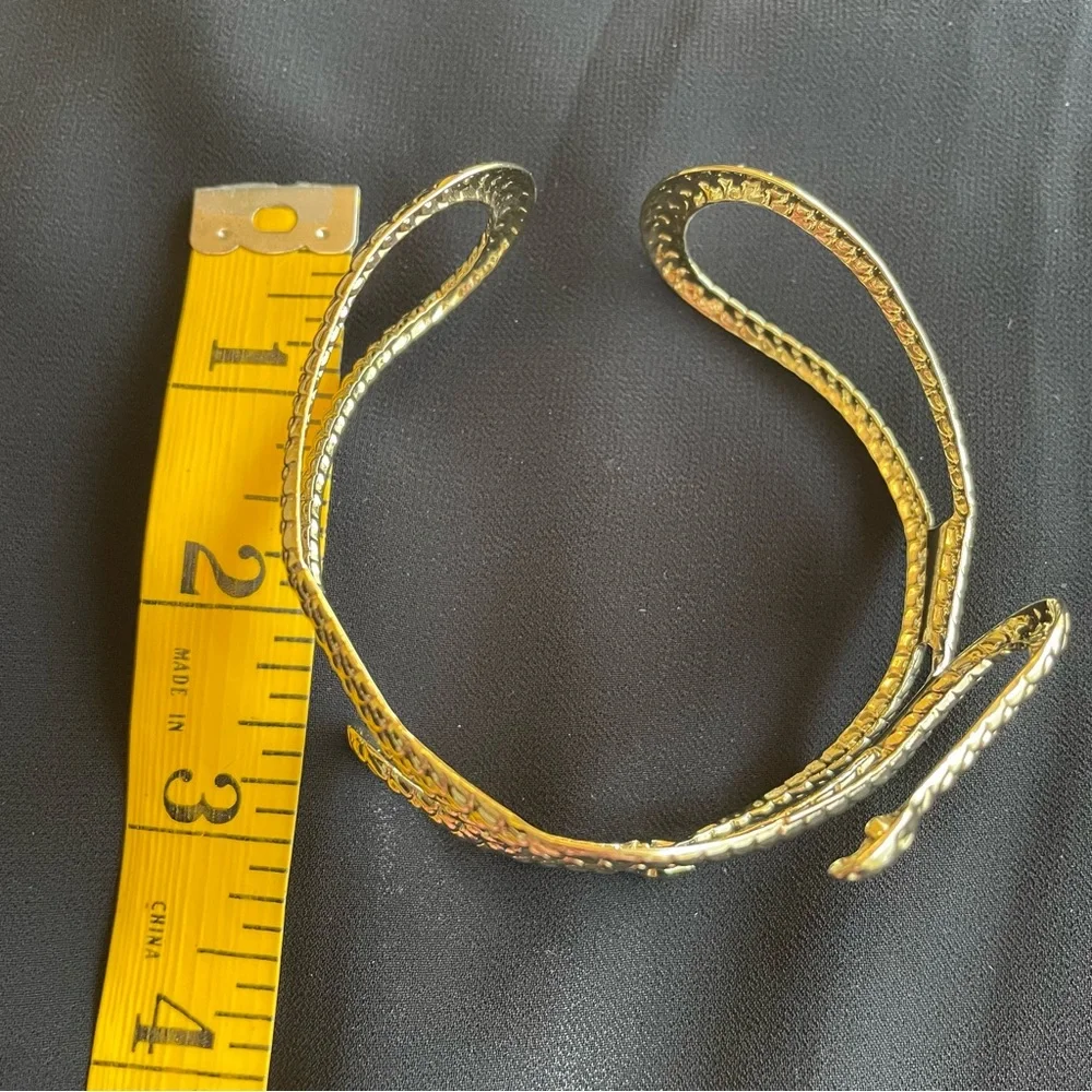 Gold tone metal snake arm cuff